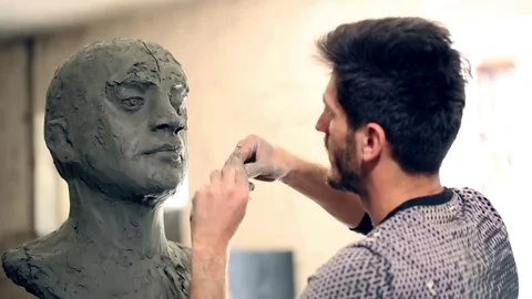 Sculptor is working on the creation of a monument Stock Footage 75459515