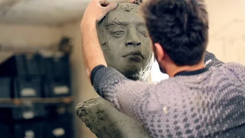 Sculptor is working on the creation of a monument Stock Footage 75459528