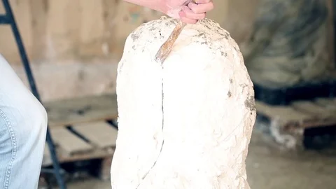 Sculptor is working on the creation of a monument Stock Footage 75459547