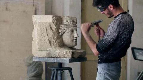 Sculptor is working on the creation of a monument Stock Footage 75460184
