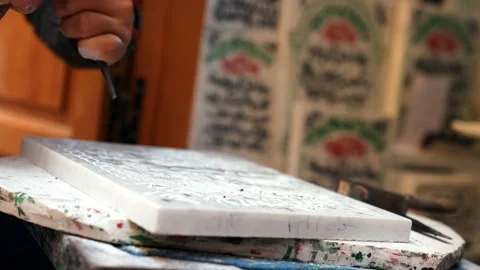 Sculptor working on a piece using hammer and chisel, sculpting a white marble Video stock 168995923