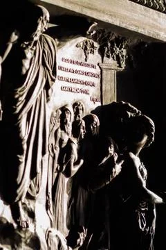 Sculpture between light and shadow of the door of the Madeleine church 写真素材