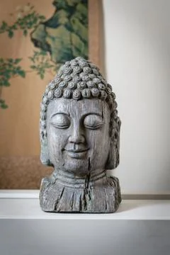 A sculpture of Buddah face Stock Photos