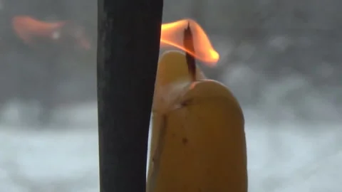 A sculpture of Christ carved from shell casing, a candlestick, Ukrainian art. Stock Footage 329510373