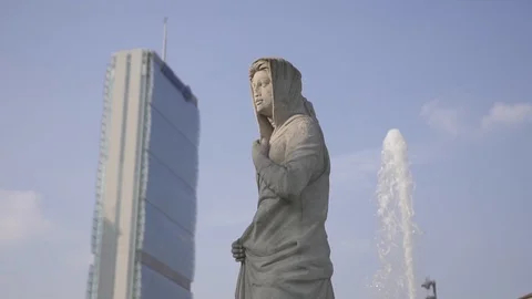 Sculpture in the cityscape Stock Footage 104046631