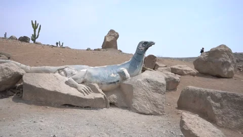  a sculpture of a lizard on the rocks on a mountain Stock Footage 145109744