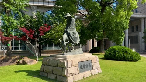Sculpture of old man on donkey back in Fudan University Stock Footage 309004905