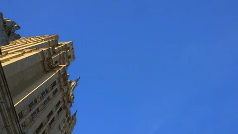Sculpture as part of the facade at the corner of the building. Stalin skyscraper 스톡 동영상 106017199