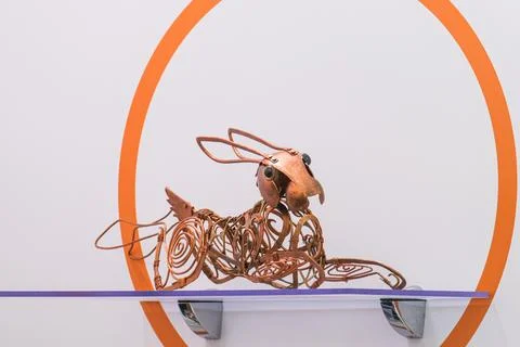 Sculpture of a rabbit made from copper wire and electrical cable. Artistic Stock Photos