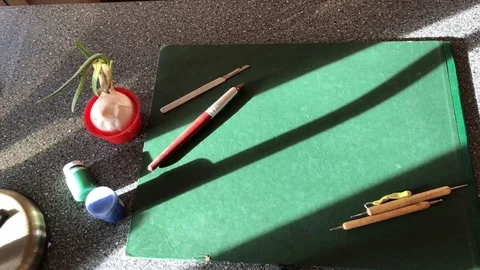 Sculpture tools on green background Stock Footage 111181107