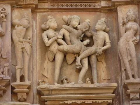 Sculptures of loving couples, illustrating the kama sutra Stock Photos