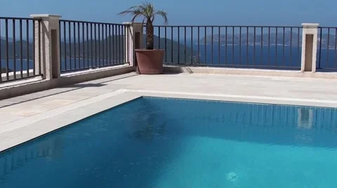 Scum on the surface of the swimming pool Video stock 51146264