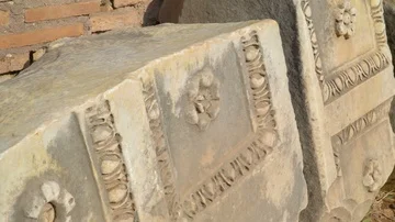 Scupltures and scriptures on the ruined walls in Rome in Italy Stock Footage 85478714