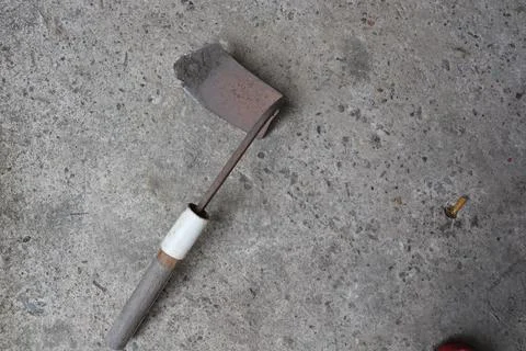 Scythe or traditional Sickle from Java used for mows the grass Stock Photos