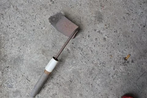 Scythe or traditional Sickle from Java used for mows the grass Stock Photos