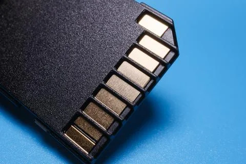 SD Card on Blue Data Storage Electronics Photograph 写真素材