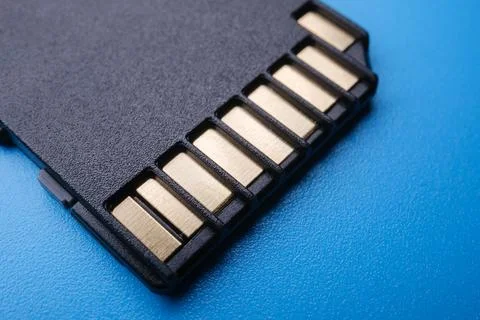 SD Card on Blue Data Storage Electronics Photograph 写真素材