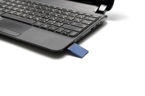 Sd card insert in laptop Stock Photos