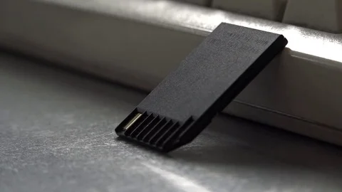 SD card leaning on keyboard Stock Footage 70499096