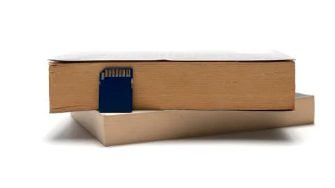 Sd card with stack of book 스톡 사진