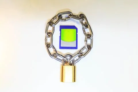 Sd memory card protected by a lock with a chain Stock Photos
