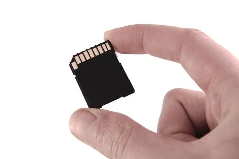 SD memory card with two fingers flash on white background Stock Photos