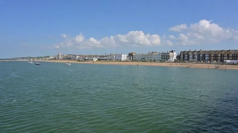 SE facing view of the sea and beach at Herne Bay, Kent Stock Footage 276331289
