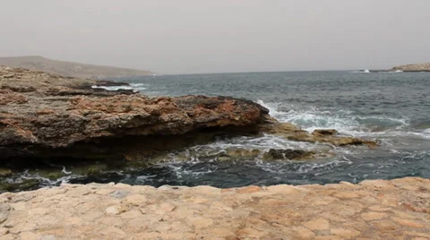 Sea Against Rocks Stock Footage 36556875