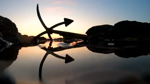 Sea anchor sunrise Stock Footage