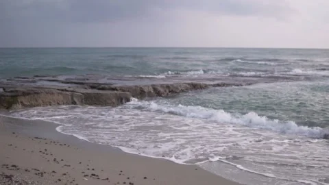 The sea and the beach in the evening in cloudy weather Stock Footage 228248578