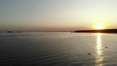 Sea and beach in the setting sun aerial footage from the air with a drone. Stock Footage 133763292