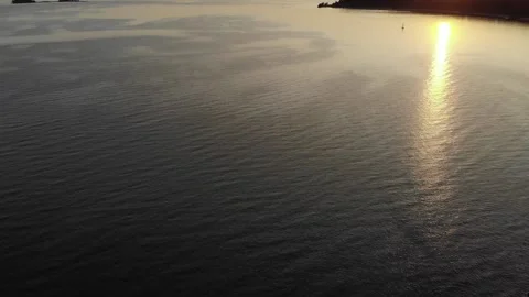 Sea and beach in the setting sun aerial footage from the air with a drone. Stock Footage 133763307