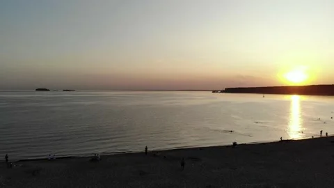 Sea and beach in the setting sun aerial footage from the air with a drone. Stock Footage 133763324
