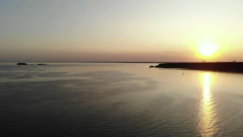 Sea and beach in the setting sun aerial footage from the air with a drone. Stock Footage 133763359