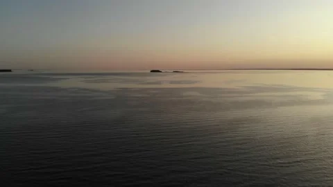 Sea and beach in the setting sun aerial footage from the air with a drone. Stock Footage 133763405