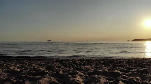 Sea and beach in the setting sun aerial footage from the air with a drone. Stock Footage 133763443