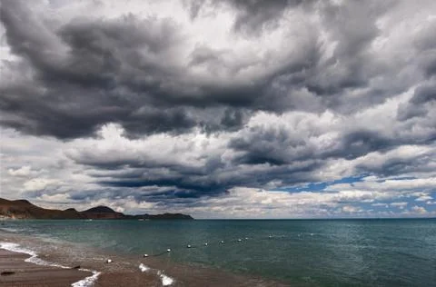 Sea and clouds Stock Photos