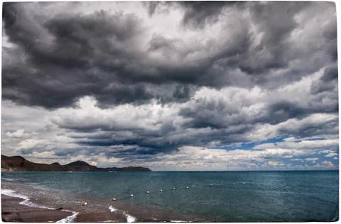 Sea and clouds Stock Photos