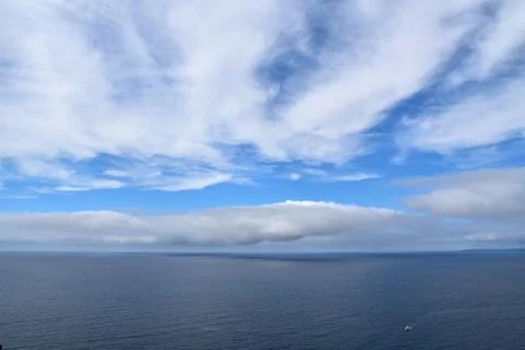 The sea and the clouds Stock Photos