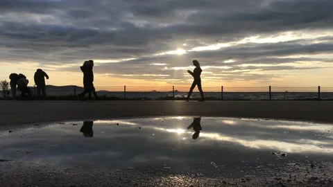 Sea and cloudy sunset Stock Footage 145897648