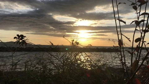 Sea and cloudy sunset Video stock 145900087