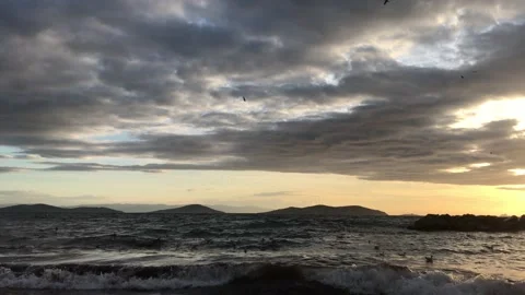 Sea and cloudy sunset Video stock 145900144