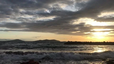 Sea and cloudy sunset Stock Footage 145902597