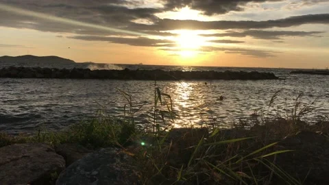 Sea and cloudy sunset Stock Footage 145902604