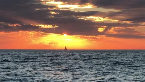 Sea and cloudy sunset Stock Footage 145911317