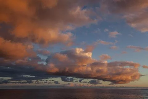 Sea and dramatic cloud atmosphere evening light sunset Paul do Mar Madeira Stock Photos