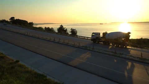 Sea and highway at sunset Stock Footage 112274367