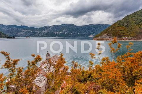 Sea and mountains in bad rainy weather Stock Photos