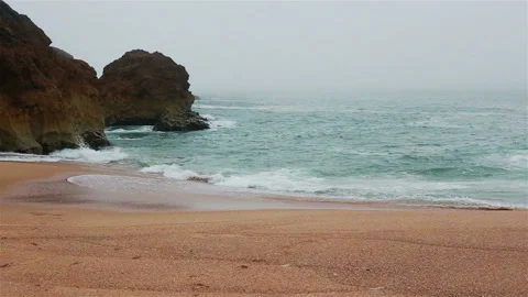 Sea and sandy beach in dense fog, autumn day Stock Footage 119959705