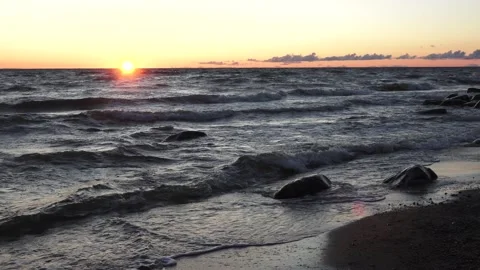 Sea and waves at sunset Stock Footage 159485864